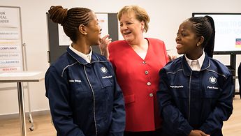 Chancellor Merkel with trainees of BMW in Rosslyn